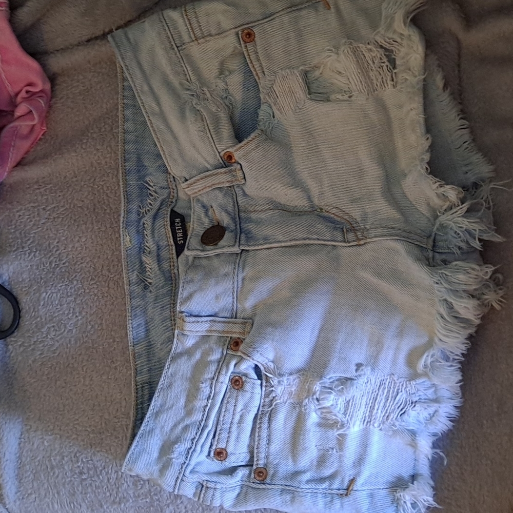 American Eagle distressed low-rise stretch jean shorts size 0 25